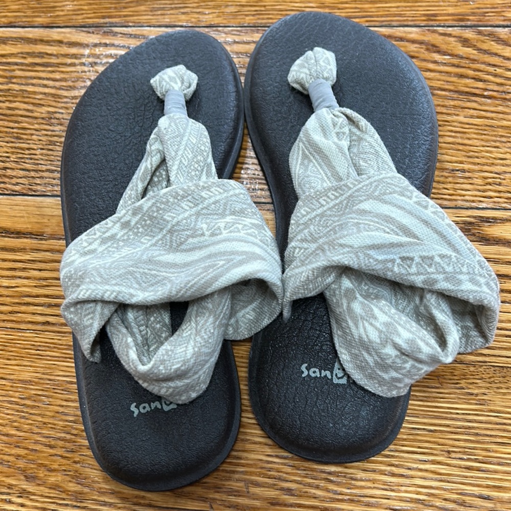 Sanuk yoga mat sling sandals, size 7.  Upper is fabric in neutral tan/cream.